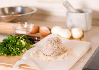 Uncooked Scotch eggs