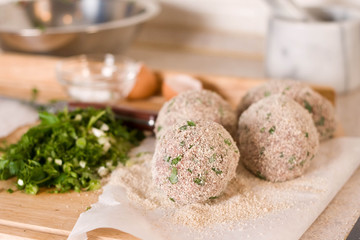Uncooked Scotch eggs