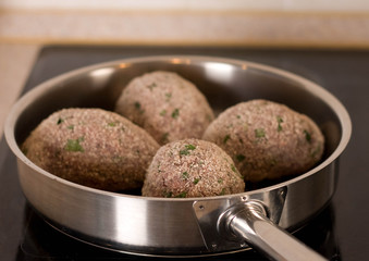 Minced-meat cutlet  in frying pan