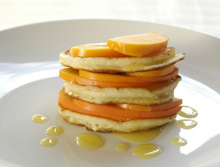 Fototapeta na wymiar Pancakes with fruits and honey