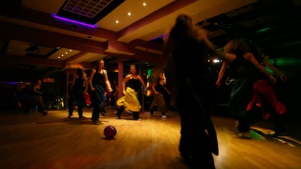 dance troupe dancing with ball - Powered by Adobe