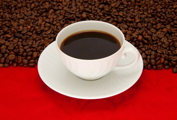 Coffee cup over red background