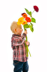 little boy giving flowers