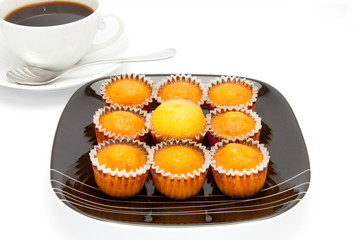 cakes on a plate , isolated over white