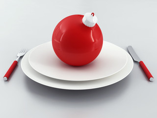 red christmas ball on a white dish