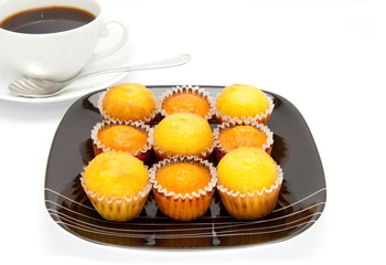 cakes on a plate , isolated over white