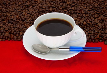 Coffee cup over red background