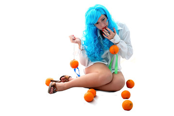 Fototapeta na wymiar blue hairs girl with oranges