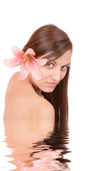 Beautiful woman in spa isolated on white