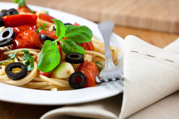 Spaghetti with roasted cherry tomatoes and olives