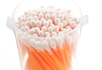 cotton buds in transparent plastic box