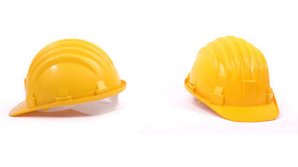 Isolated yellow protective helmets