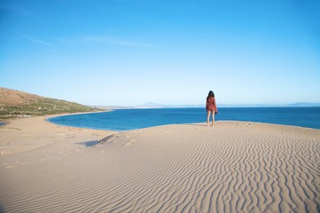 woman big dune and sea