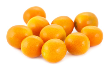 Pile tangerines isolated on white