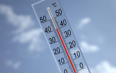 a thermometer showing 40° with sky background
