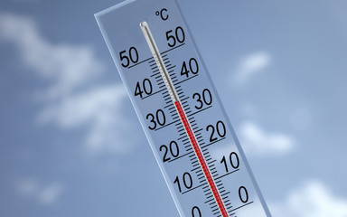 a thermometer showing 35° with sky background