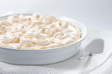 Cake with meringue in baking form