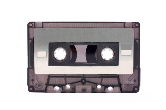 Gray-transparent Compact Cassette isolated on white