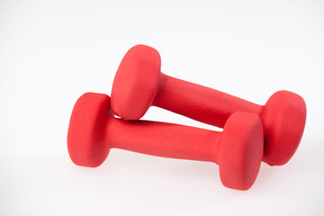 Red dumbbells isolated on a white background