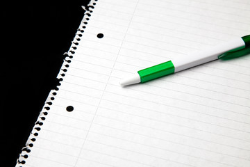 blank sheet of paper with pen