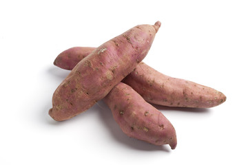 Sweet potatoes on white background
