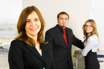 Happy young businesswoman.