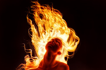 fire girl on the black background