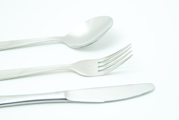 Fork, spoon and knife