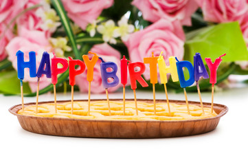 Happy birthday candles in the pie