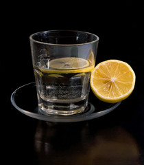 glass of water with lemon slice
