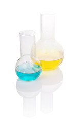 flasks with yellow and blue chemical liquid