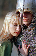 Young medieval couple, strong soldier and maid