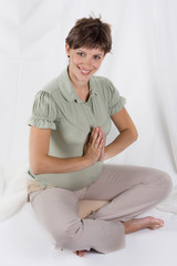 Fototapeta premium pregnant woman doing yoga.