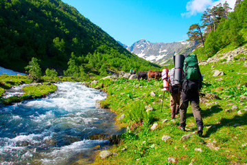 Hiker in Caucasus mountains