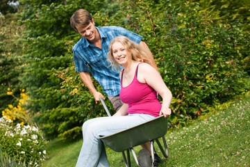 Fototapeta premium Country life – couple with wheelbarrow