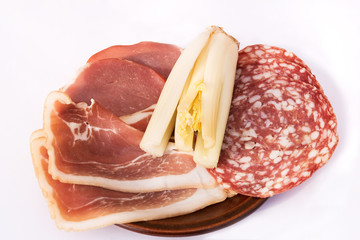 Dish of smoked bacon and salami