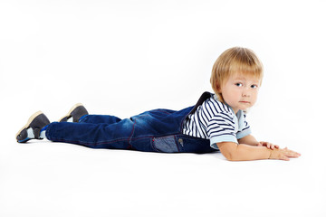 The little boy in dark blue overalls