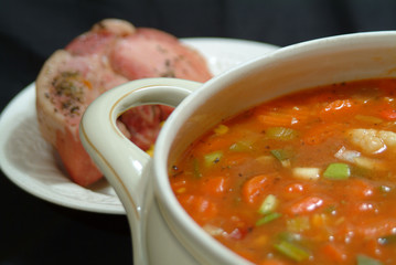 organic vegetable soup with meat on a plate