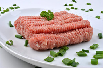minced meat with parsley on a plate