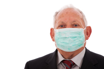 Older businessman with a mask