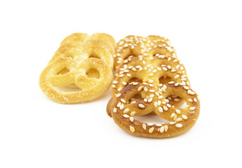 Knot-shaped biscuit with sugar and sesame