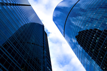 Fototapeta premium view to blue skyscrapers towers