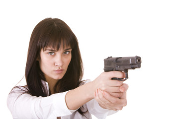 Beautiful young women with gun. Isolated.