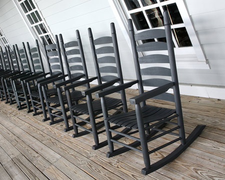 Rocking Chairs Lined Up On The Porch