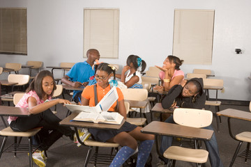 Highschool students messing in class during break