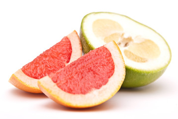 red and green grapefruit and parts of it isolated