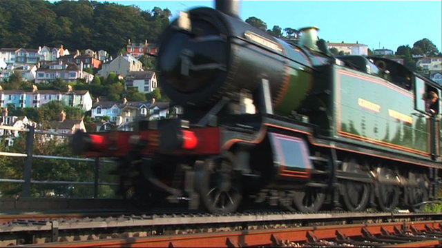 Steam train leaving the station