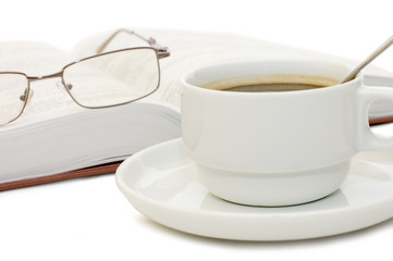 The book and cup from coffee isolated