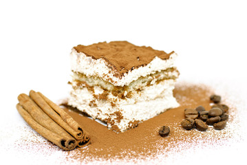 Homemade Tiramisu cake with cinnamon and coffee beans