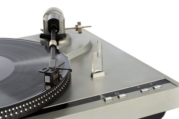 Stylish 20-years old turntable with vinyl record having